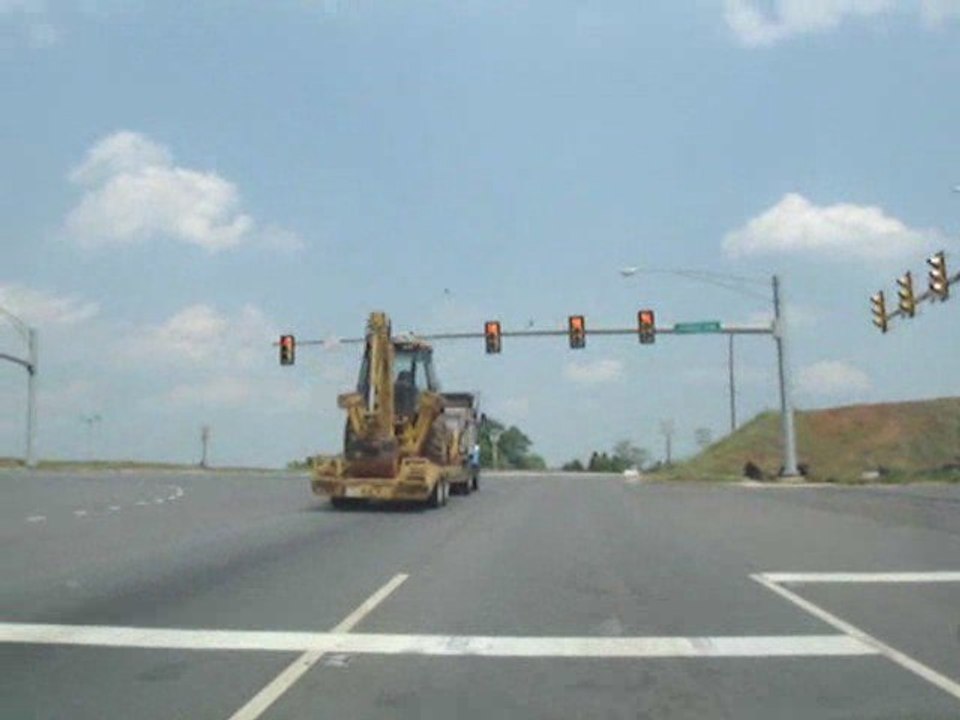 A very professional truck driver! Running a Red Light