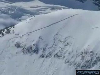Snow Mobile Causes An Avalanche