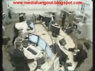 Guy goes crazy in his office!
