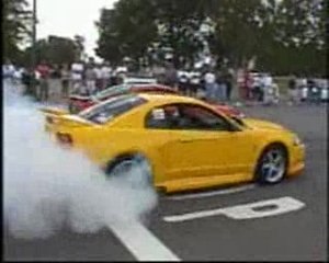 2 Roush Mustangs Burnout