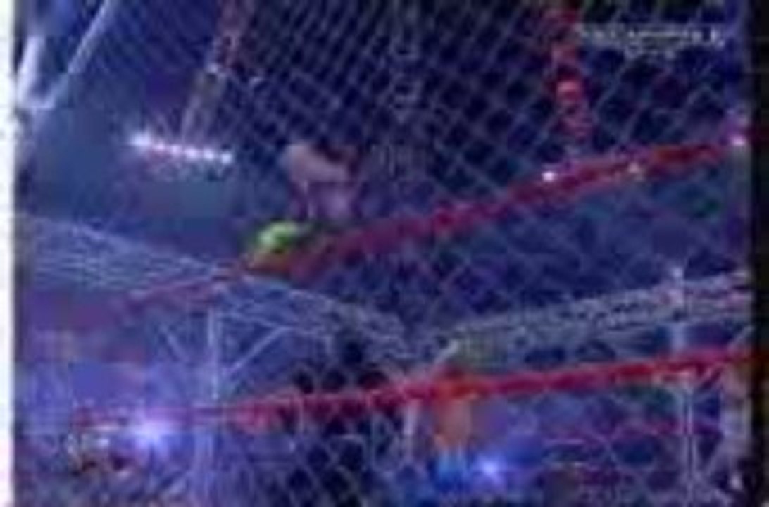 WWE - Jeff Hardy does a Dragon Attack off the cage
