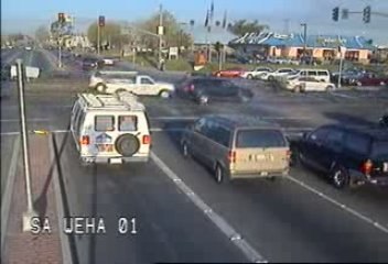 Car Going Through Cross Traffic - Video