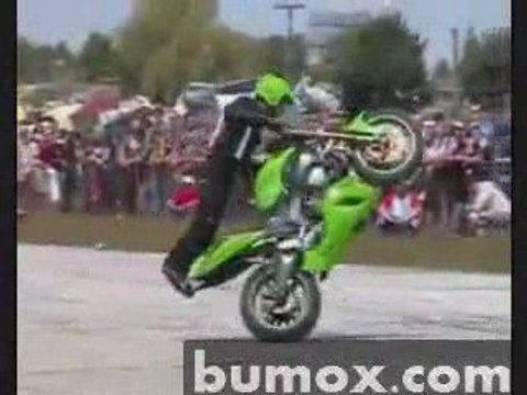 guys doing crazy stunts on motorcycle