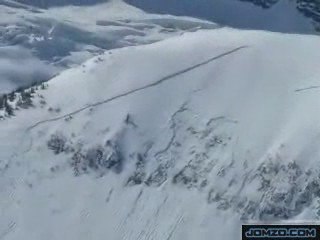 Snow Mobile Causes An Avalanche