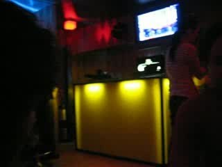 Pied and John discuss at Ernies Bar in Sendai