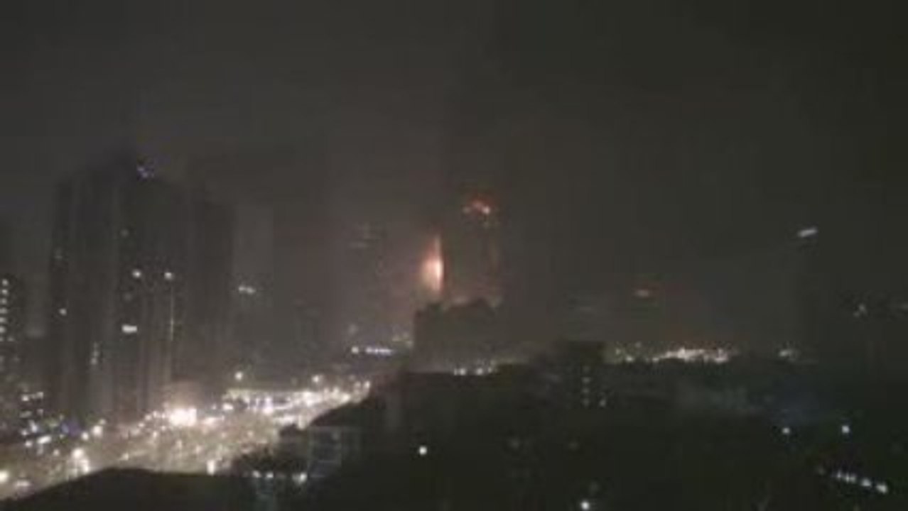 UFO over TVCC building in Bejing during fire Video