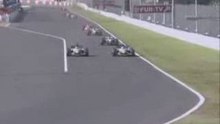 2004-Suzuka-Fernando Alonso pasa a Jacques Villeneuve