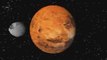 The planet Mars as observed above surfaces of its moons