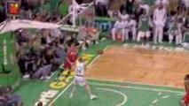 NBA Derrick Rose blocks Boston's Brian Scalabrine during the