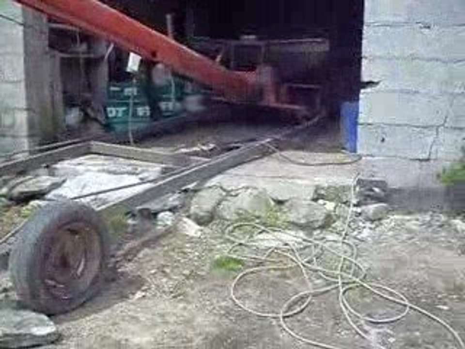 transevasion de grain avec la vis le vario 711 et la brigant