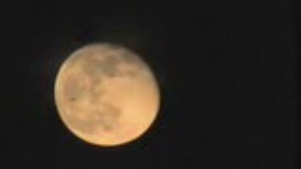 huge Ufo's flying in front of the moon