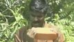 Madras, India: Man eats bricks, rocks, gravel