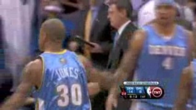 Dahntay Jones picks off Josh Howard's pass under the Maveric