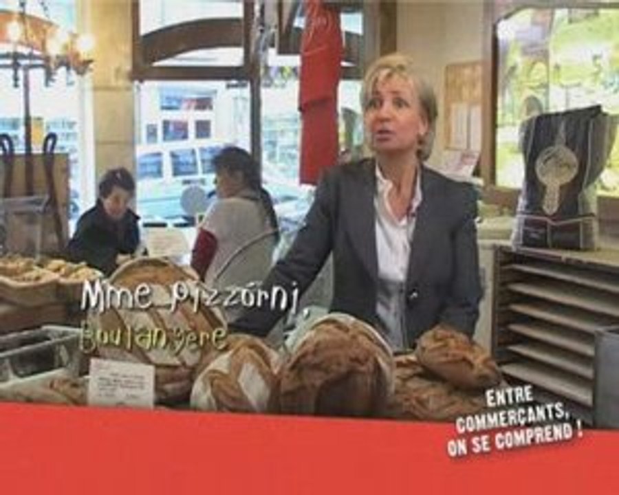 Mme Pizzorni, boulangère, mène son commerce à la baguette