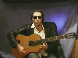 "WAITING ON THE WORLD TO CHANGE" cover