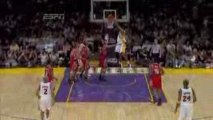 Andrew Bynum cleans up a missed lay up by Pau Gasol.