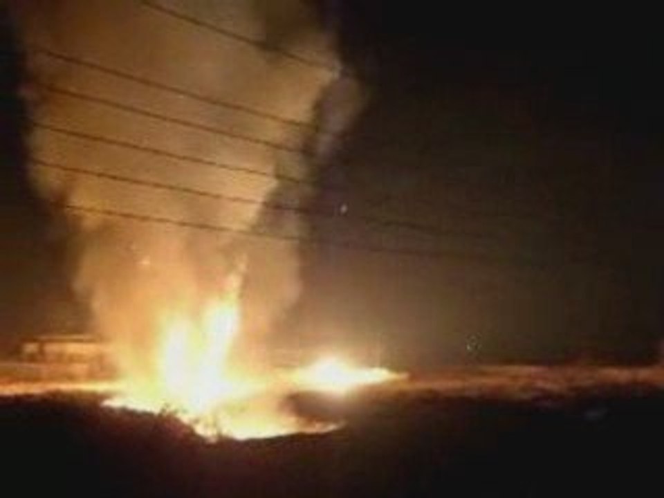 The US 2 4 Marines battle insurgents in  Iraq.