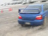Subaru Impreza drifting on snow