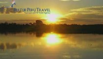 Iquitos Travel - The Amazon River in the Peruvian Amazon rai