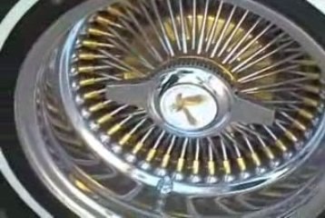 Twin shows off new work on his car.