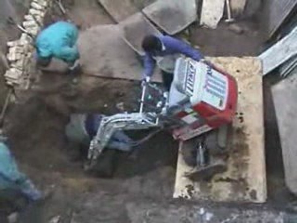 un  faceplant en pelleteuse