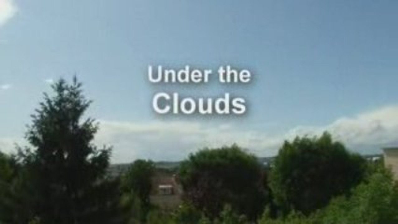 Under the clouds