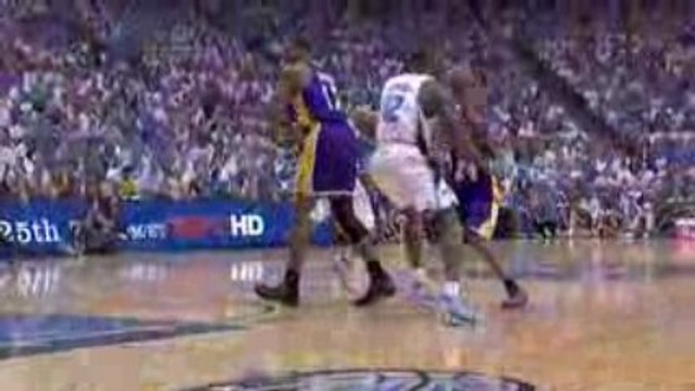 Kobe Bryant dishes to Andrew Bynum who pounds the paint and
