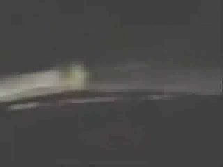 ALIEN GREY APPEARS FROM THIN AIR IN FRONT OF CAR